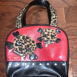rare demonia skully fur purse